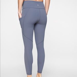 Athleta stash Pocket Salutation Tight